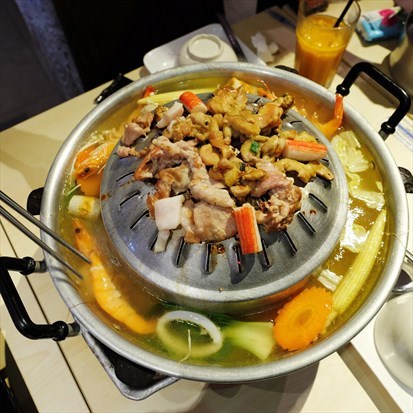 Sizzling Meats over Charcoal