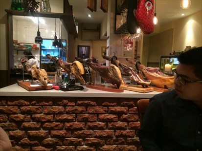 Offering five different types of Spanish ham.
